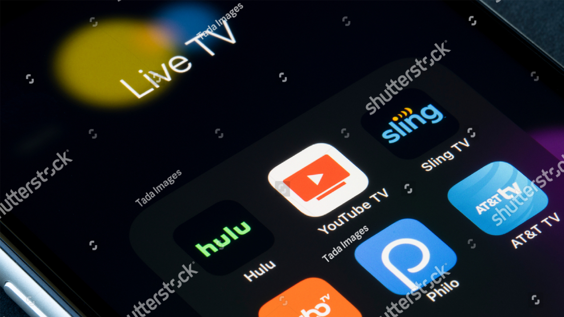 Assorted apps for live television streaming are seen on an iPhone, including Hulu, YouTube TV, Sling TV, FuboTV, Philo, and ATT TV