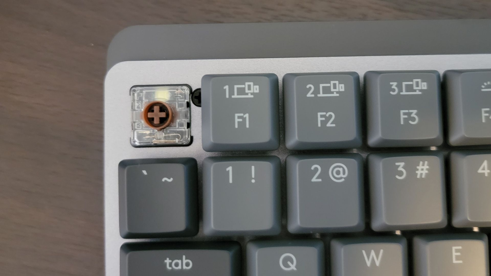 closeup of the brown switch on logitech mx mechanical mini keyboard