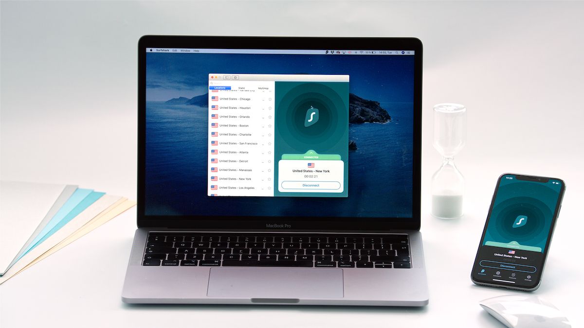 Surfshark VPN running on a MacBook and iPhone