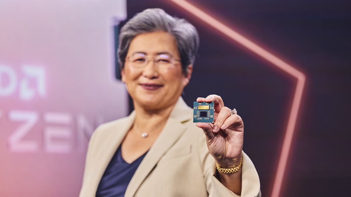 Photo of Dr. Lisa Su holding a Ryzen processor