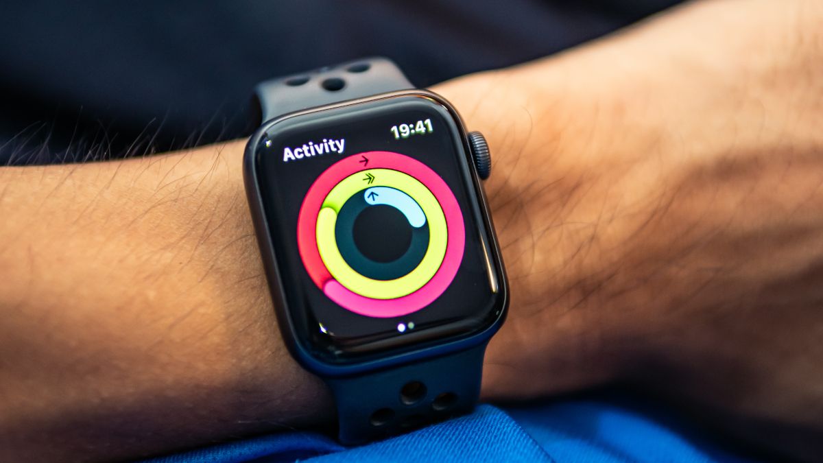 Apple Watch Nike+ Series 4 with activity rings on display.