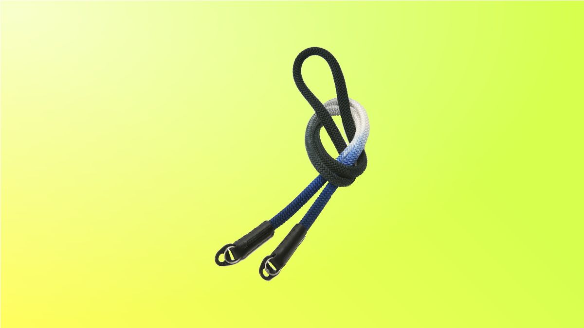 Artissan and Artist neck strap on yellow background