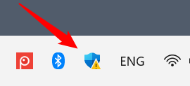 Ckick the blue shield icon on the task bar.