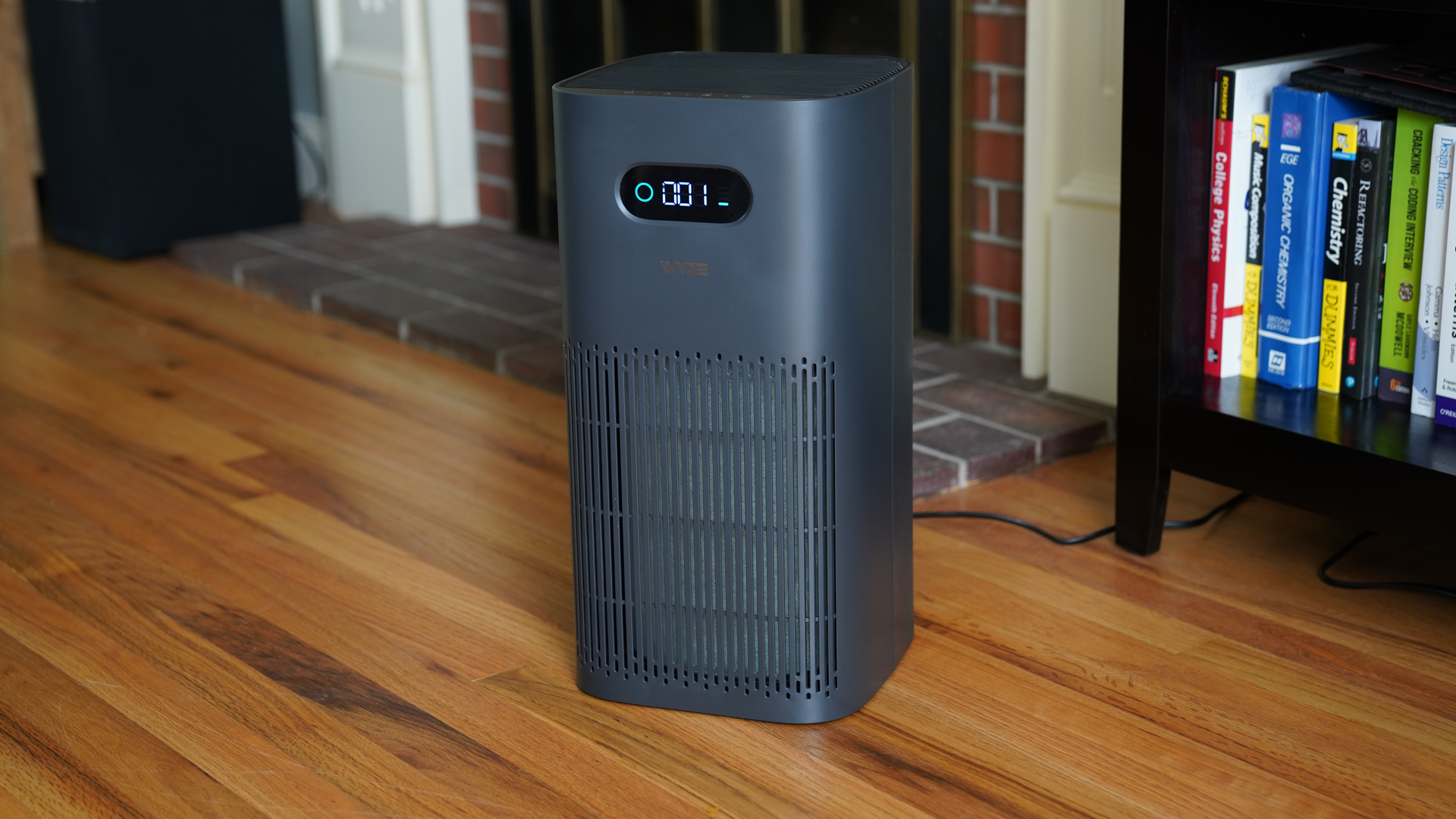 The Wyze Air Purifier cleaning the air in a bright living room.
