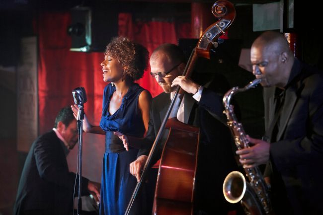 A jazz band performing at a nightclub.