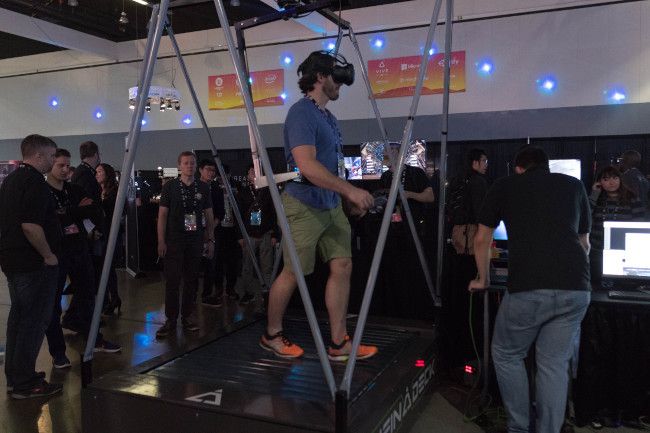 Man walking on a VR treadmill at the VRLA expo.