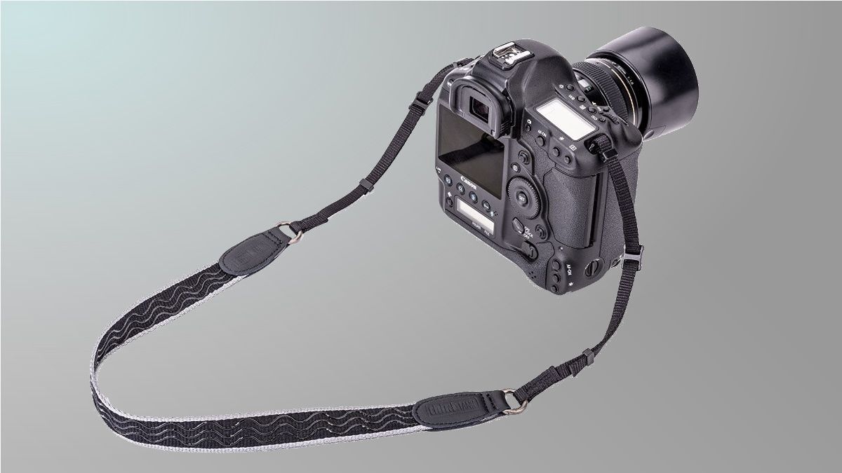 Think Tank camera strap on grey background