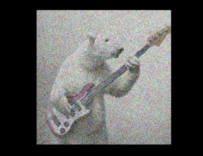 An example of DALL-E 2's diffusion image generation making a polar bear playing a bass guitar.
