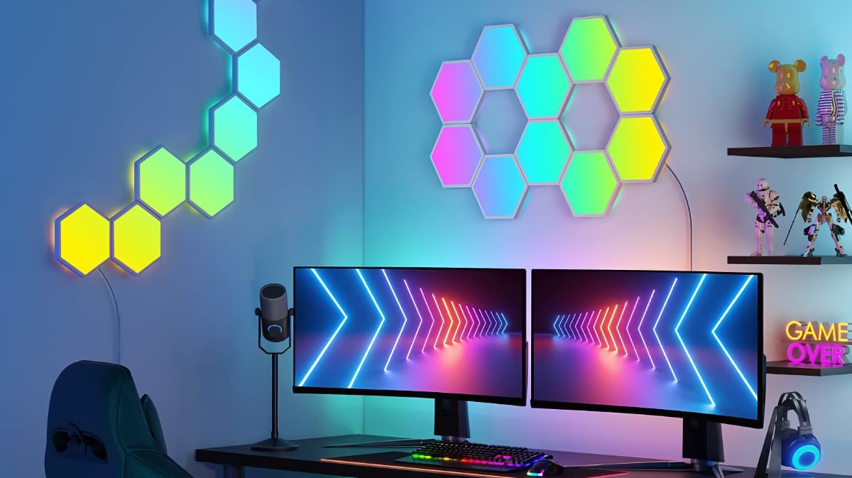 Govee Hexagon Light Panels lit up on a wall inside a gaming room