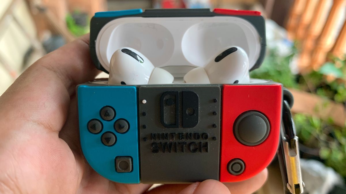 Apple AirPods in a case designed to look like a Nintendo Switch.