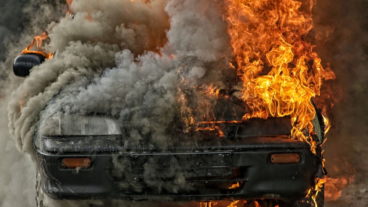 A car in flames.
