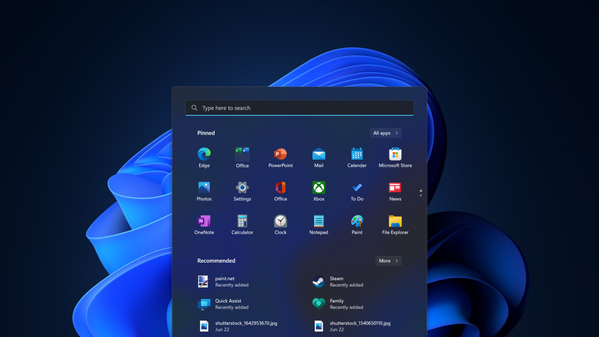 Windows 11's Start menu and desktop in dark mode.
