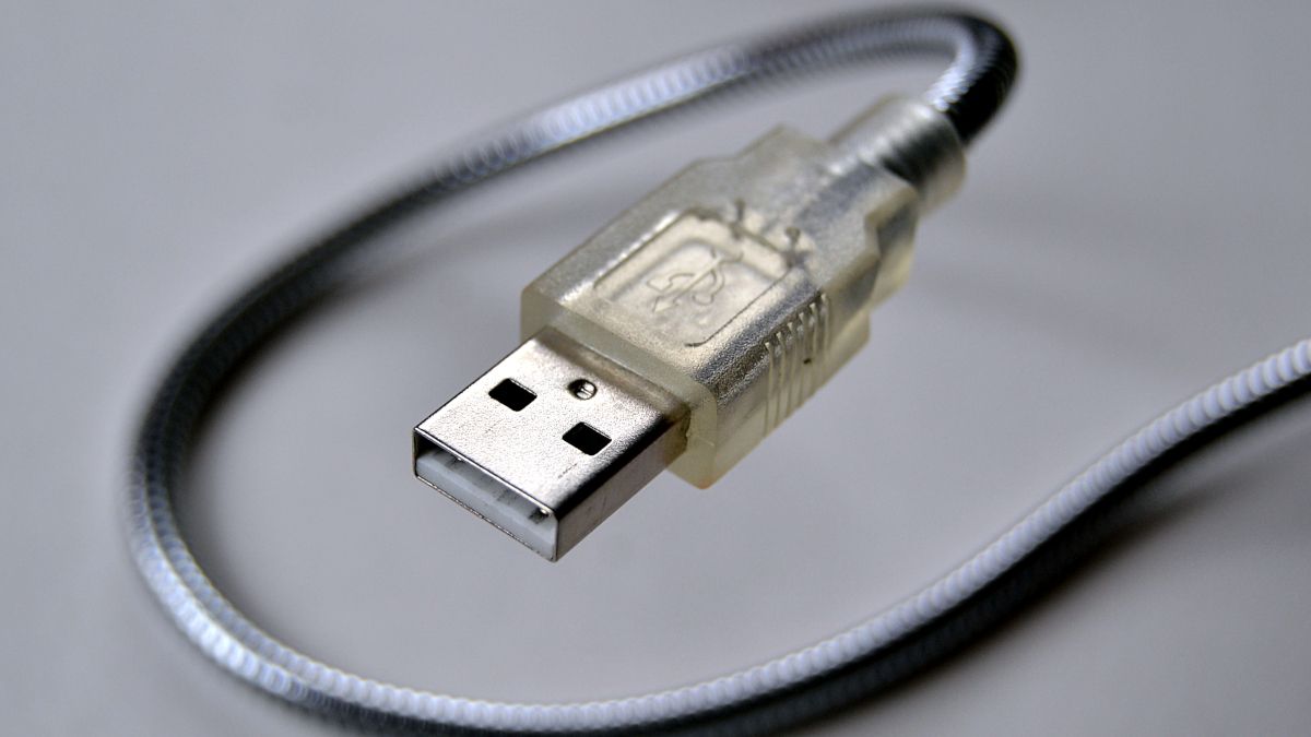 Closeup of a USB-A cable connector with a semi-transparent casing.