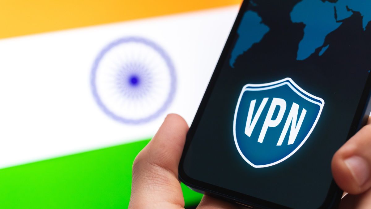 A VPN application running on a smartphone in front of the flag of India.