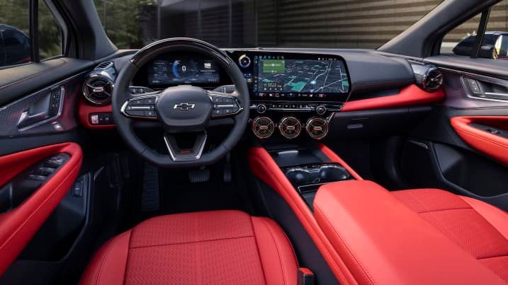 Photo of a car interior with red highlights