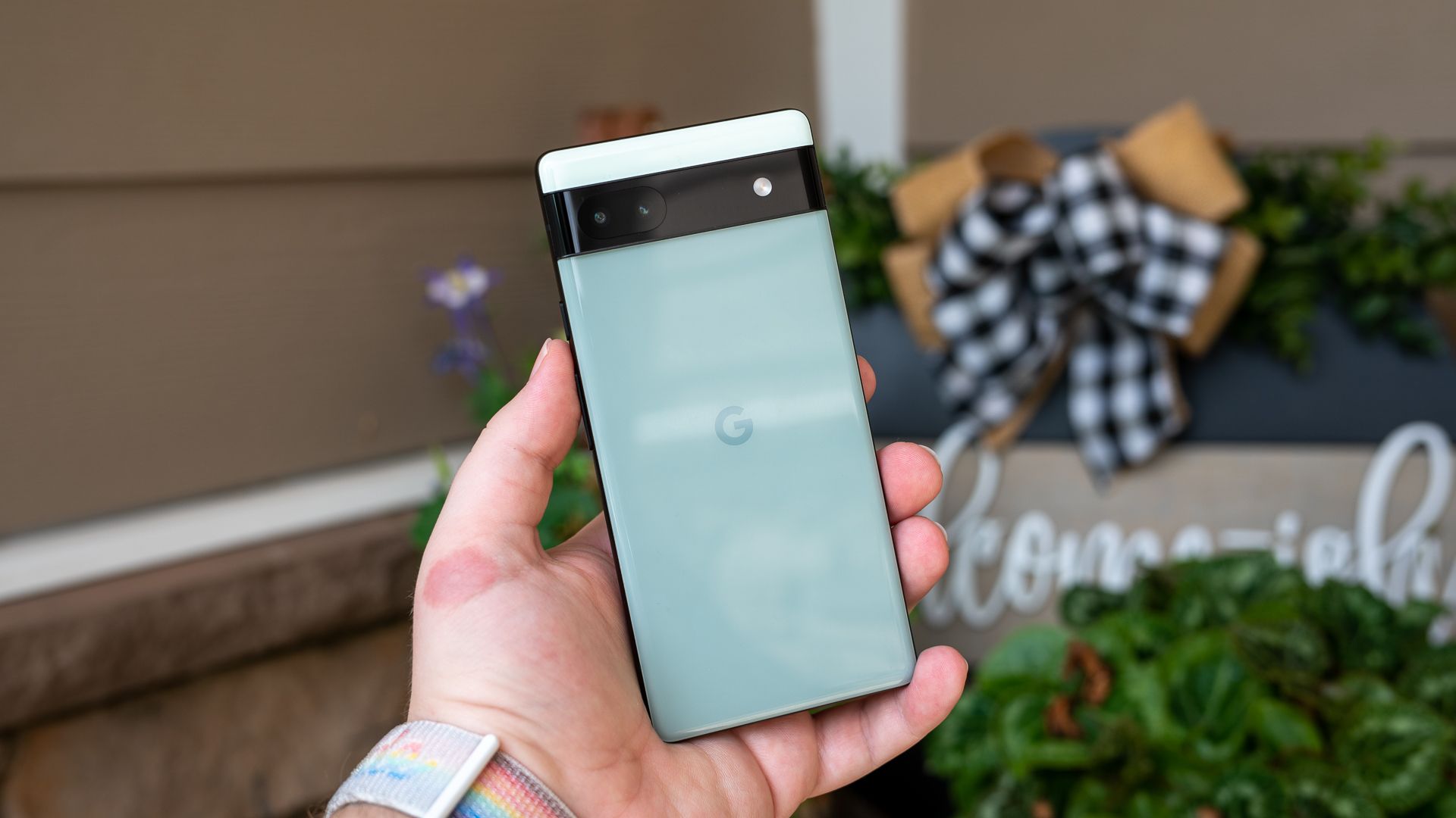 Pixel 6a held in person's hand