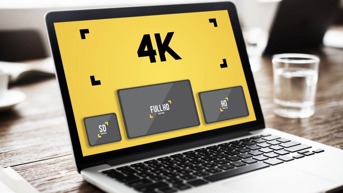 An open laptop showing 4K resolution comparisons.