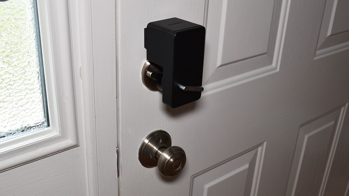 SwitchBot Lock installed on a door.