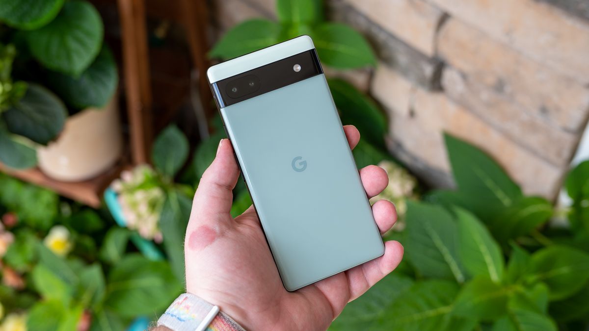 The back of the Google Pixel 6a held in a person's hand