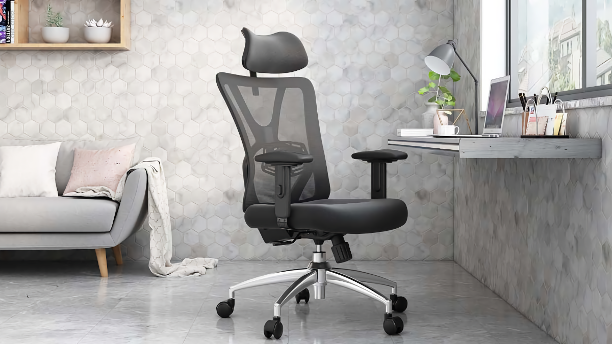 Ticova Ergonomic Office Chair sitting in a white office