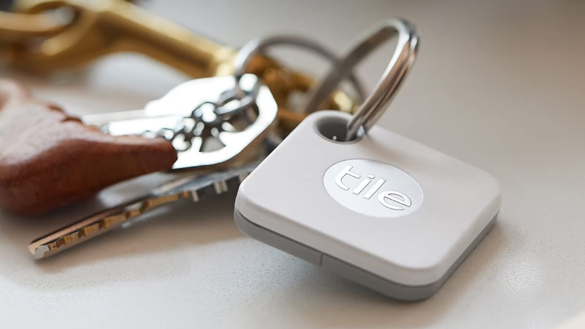 Tile Mate (2020) Bluetooth Tracker attached to a pair of keys on a table