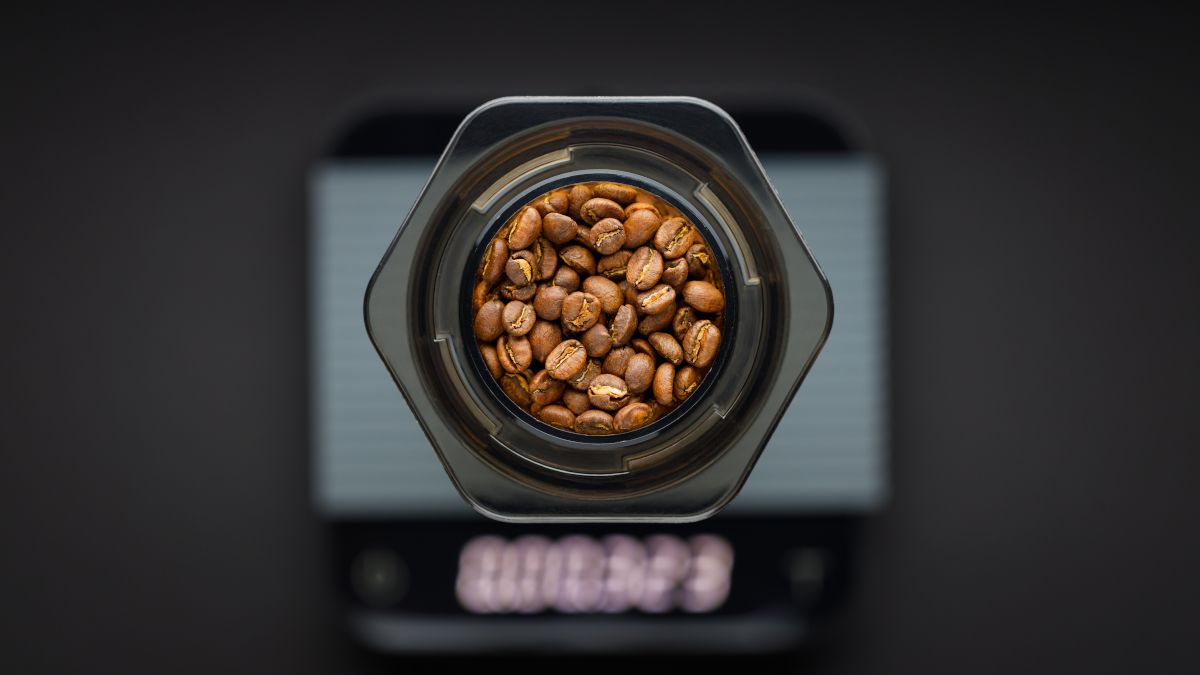 Coffee beans in an aeropress coffee maker.