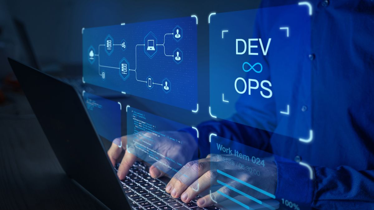 Graphic showing DevOps symbol and text overlaid on a photo of a person typing on a laptop
