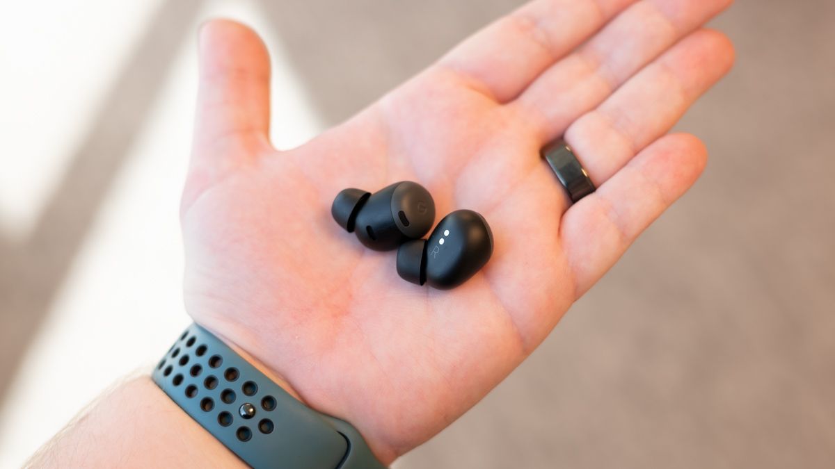 Google Pixel Buds Pro earbuds in a person's hand