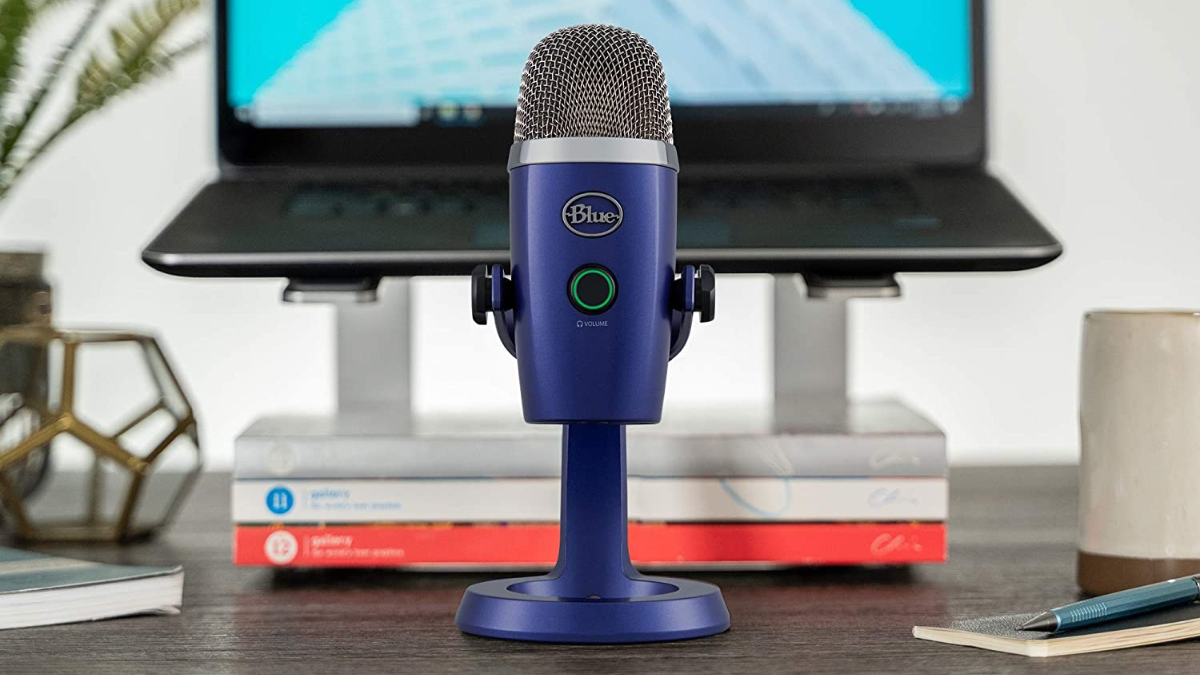 Logitech Blue Yeti Nano USB Microphone on a desk in front of a computer