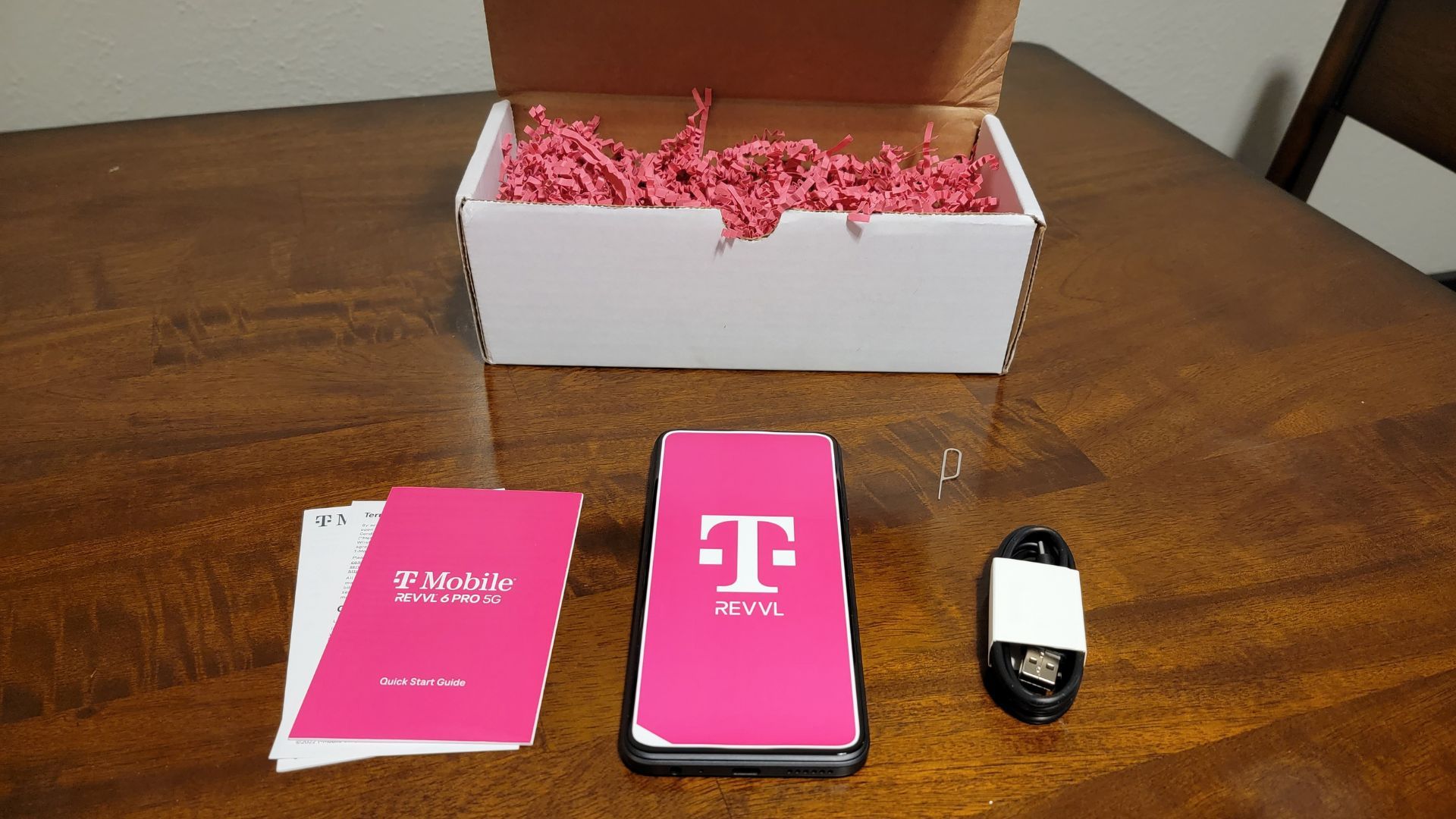 tmobile revvl 6 pro smartphone packaging, all pink in true tmobile style