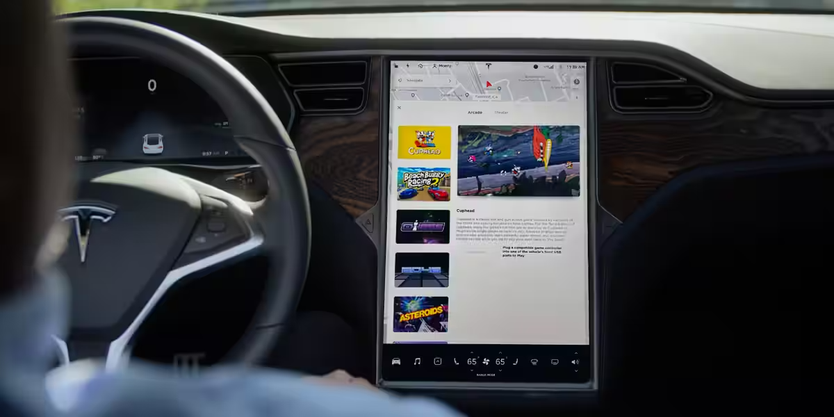 Photo of a Tesla screen with games