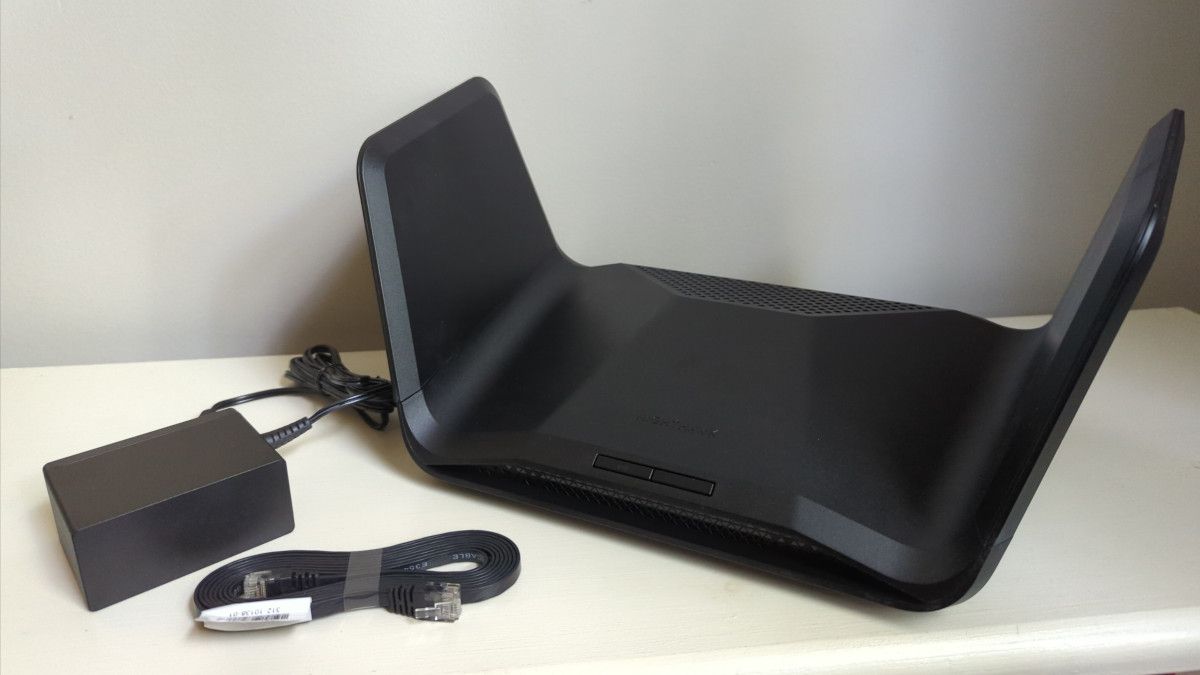 The wall plug, Ethernet cabke, and router included in the box when you buy a Netgear Nighthawk RAXE300.