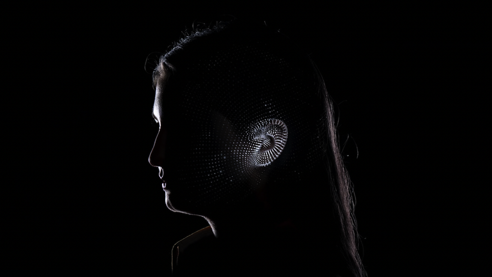 An illustration of Apple's Spatial Audio system.