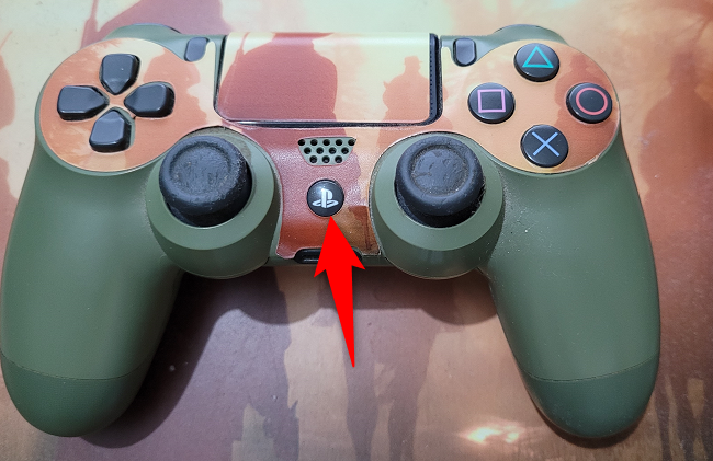 Press the PS button on the PS4 controller.