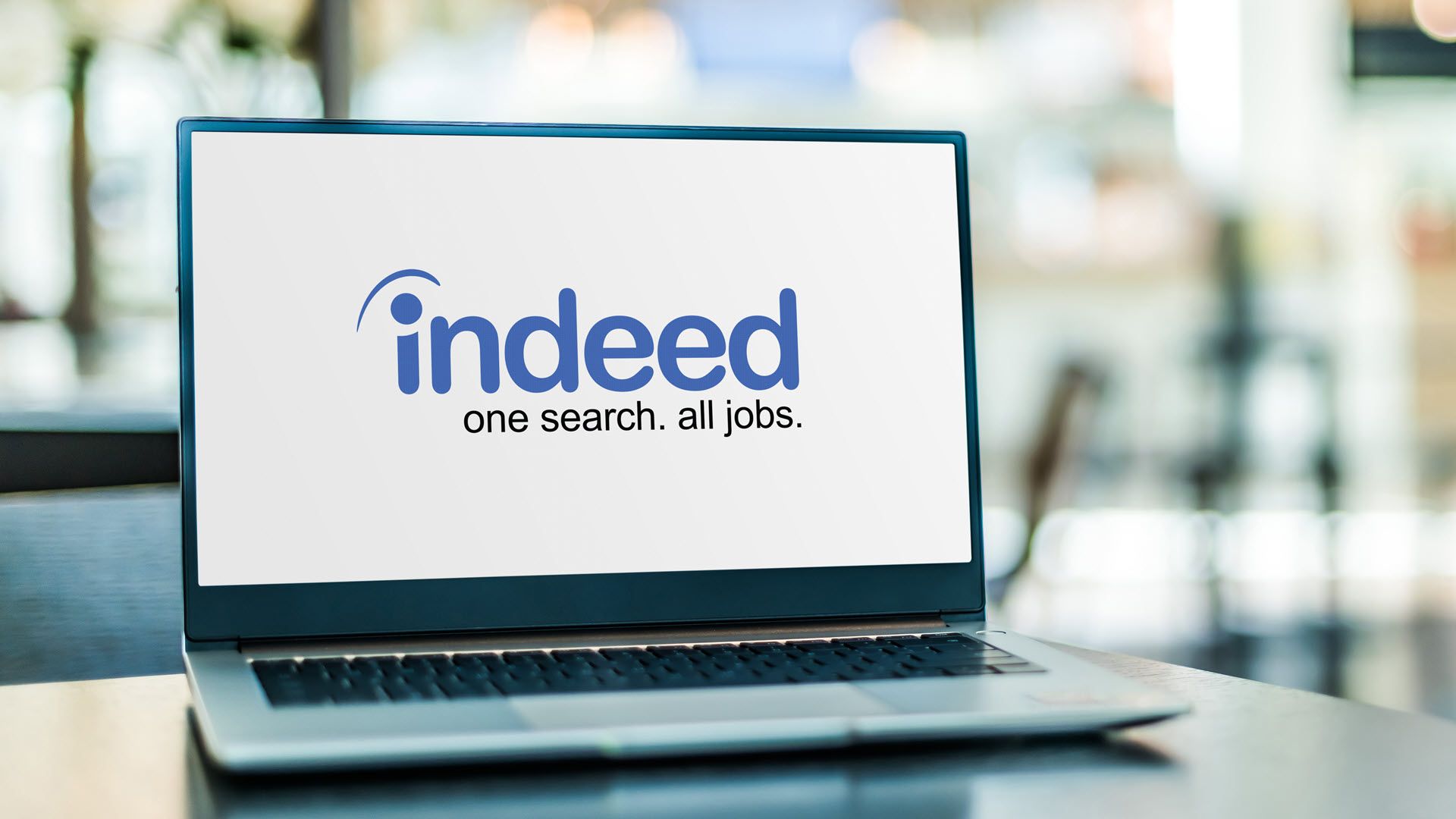 A l;aptop with the Indeed careers site open in a browser