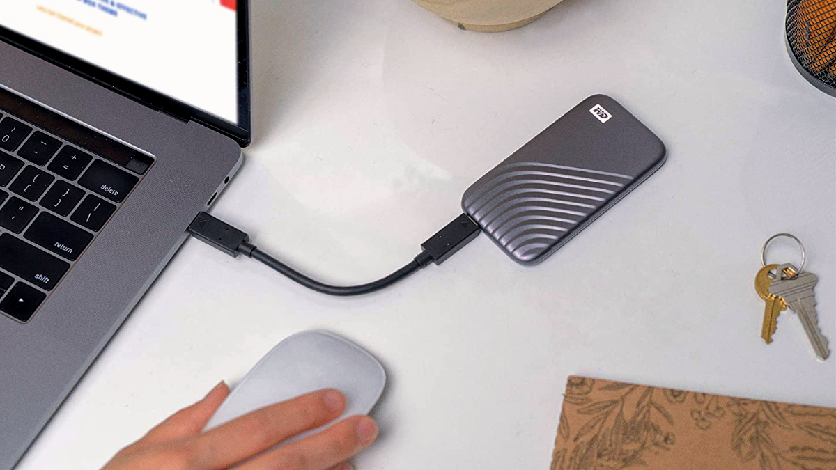 WD 1TB My Passport Portable SSD plugged into a laptop