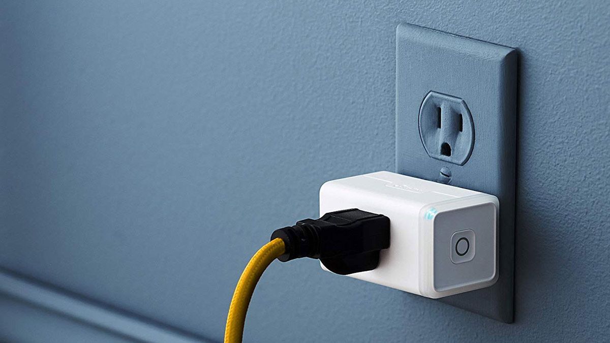 A power cord plugged into a Kasa smart plug.