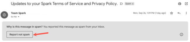 Report Not Spam button at the top of an email
