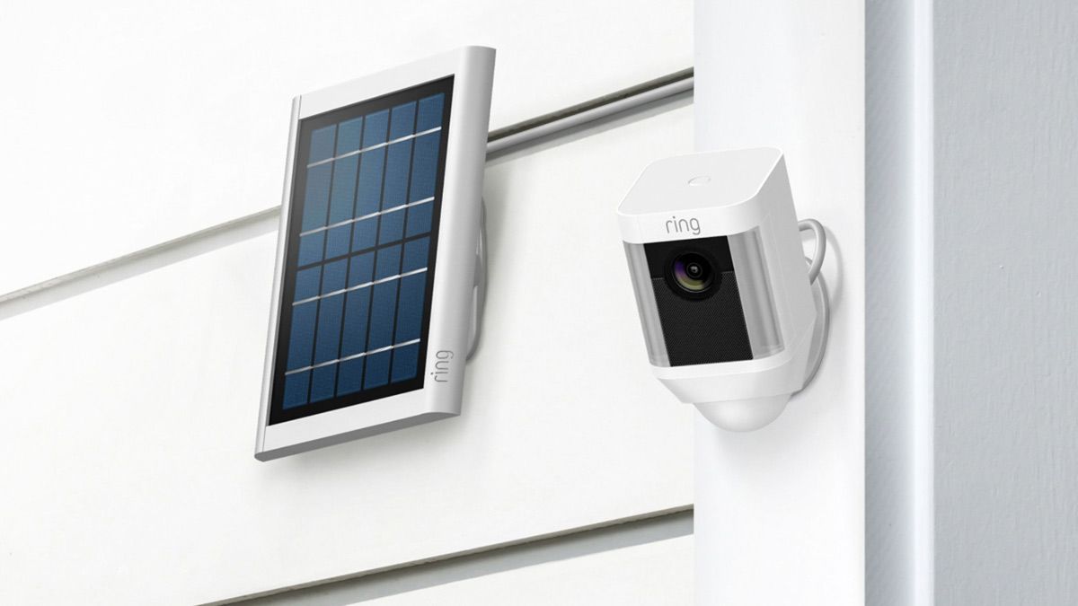A Ring camera mounted with a solar panel.
