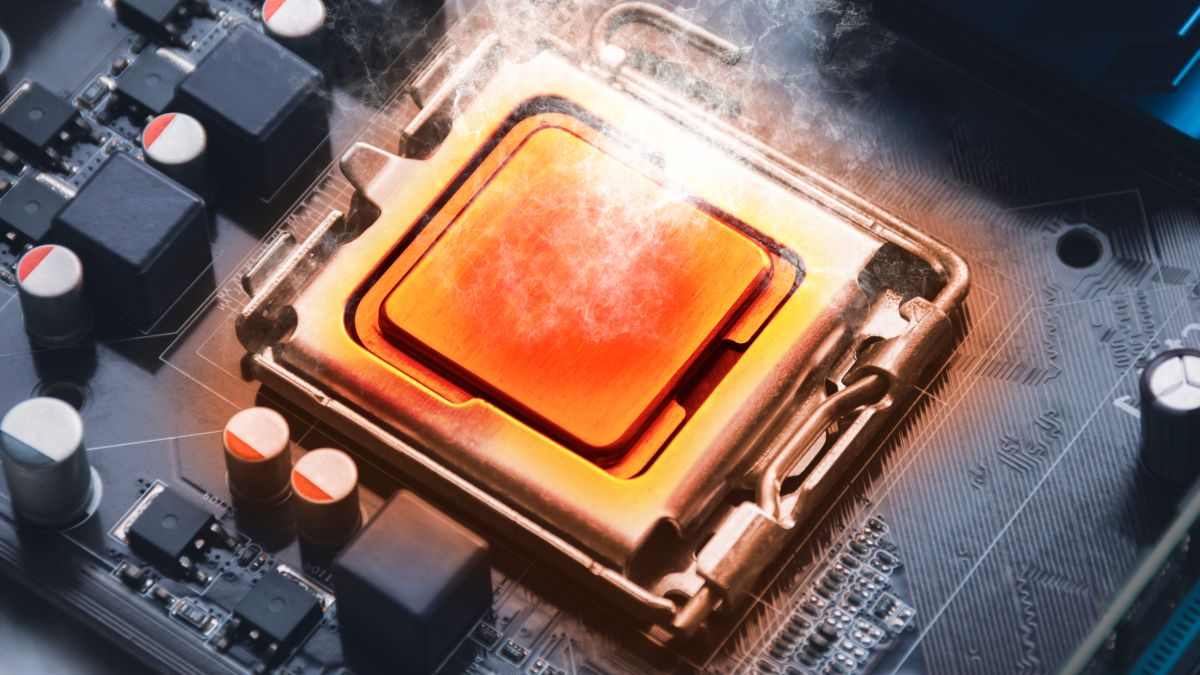 A CPU chip orange with heat and smoke flowing from it.