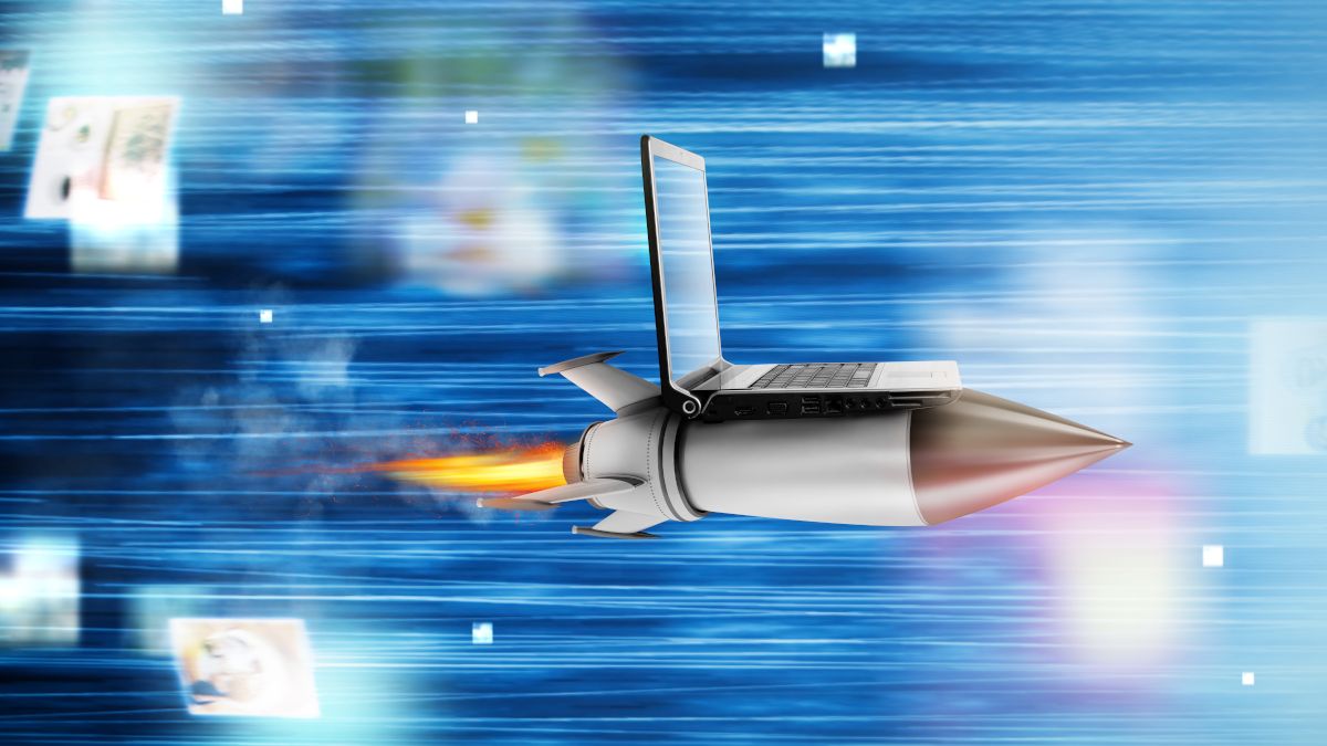 Laptop on top of a speeding a rocket.