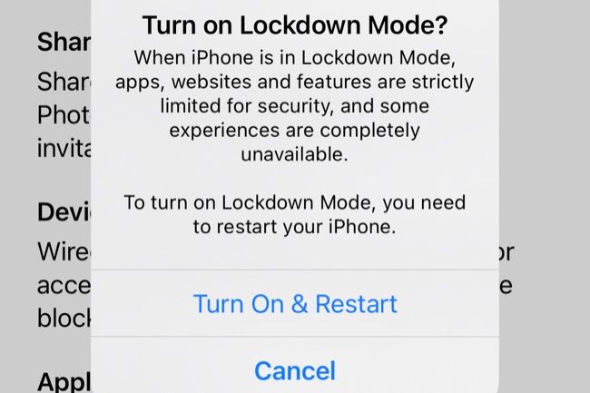 Restart iPhone to enable Lockdown Mode