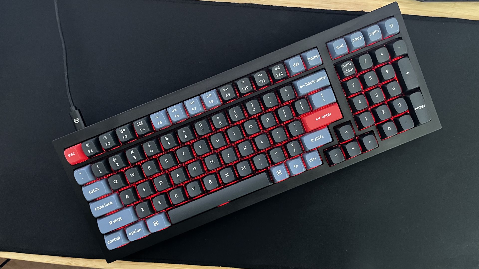 Q5 Mechanical keyboard at an angle resting on mousepad