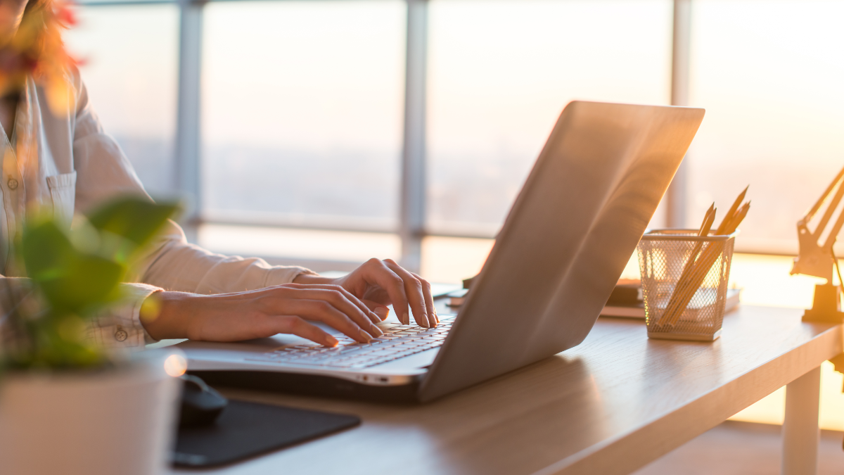Person typing on a laptop