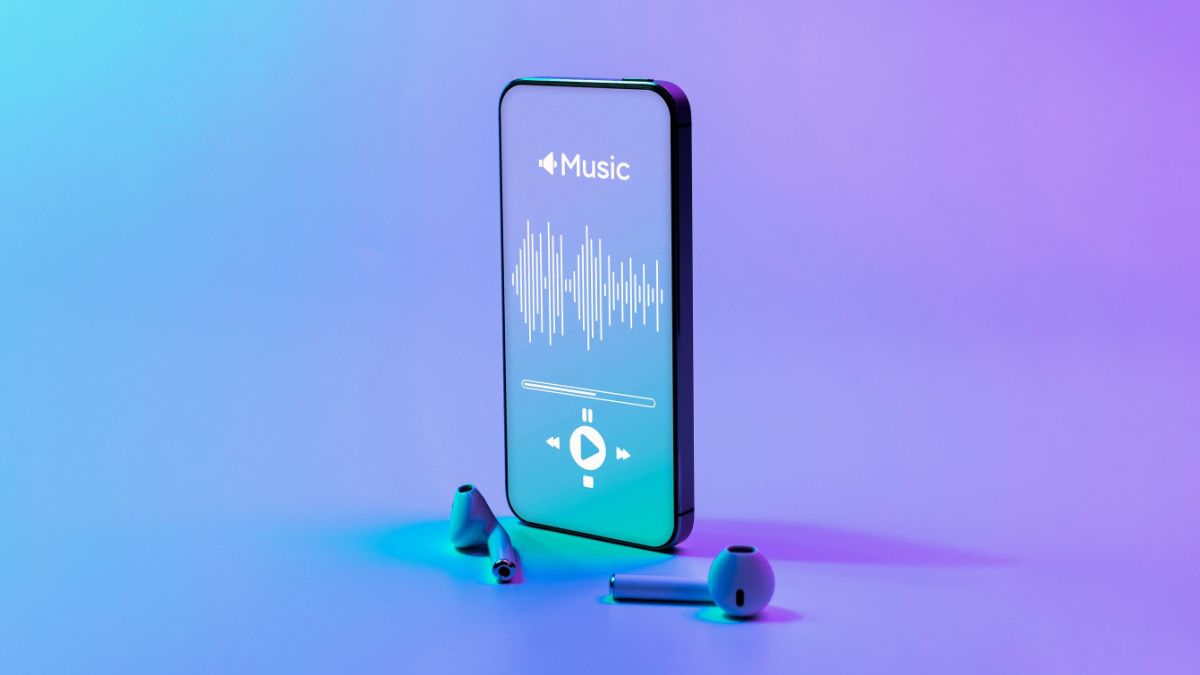 Music app and earbuds with phone.