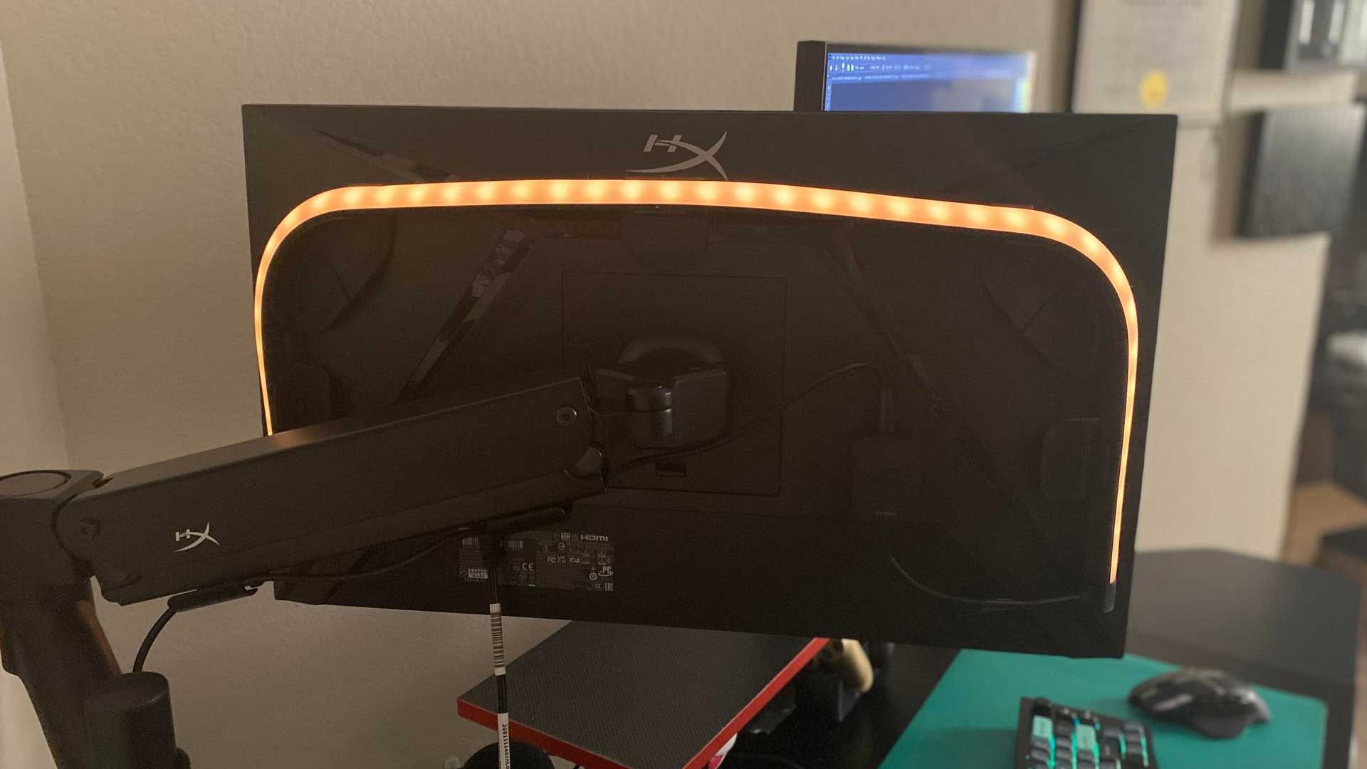 Philips Hue Play Gradient Lightstrip for PC displaying cool orange light.