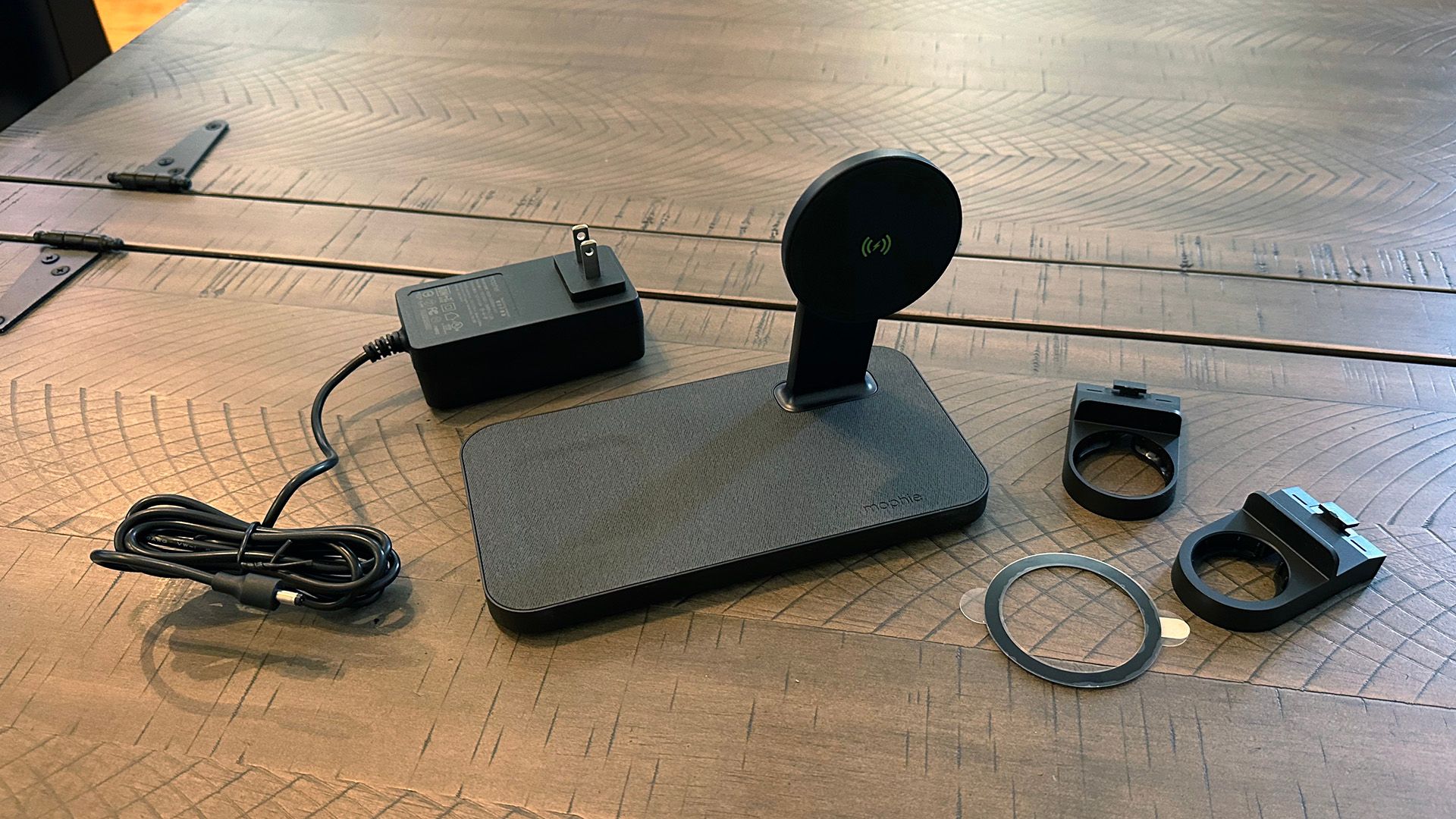 Mophie snap+, AC adapter, snap adapter, and watch adapters on a table top
