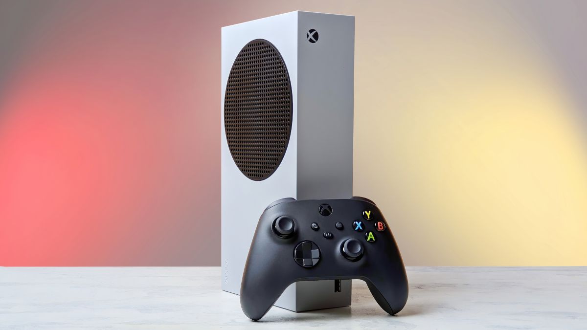 A white Xbox Series X with a black controller.