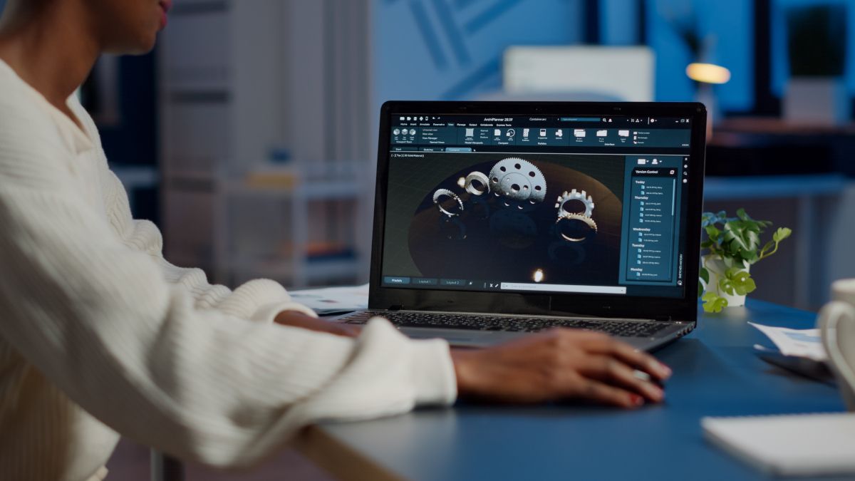 Engineer working on a laptop to do industrial design.
