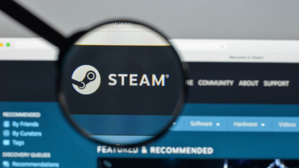 Magnifying glass highlighting the Valve Steam logo on the Steam store webpage.